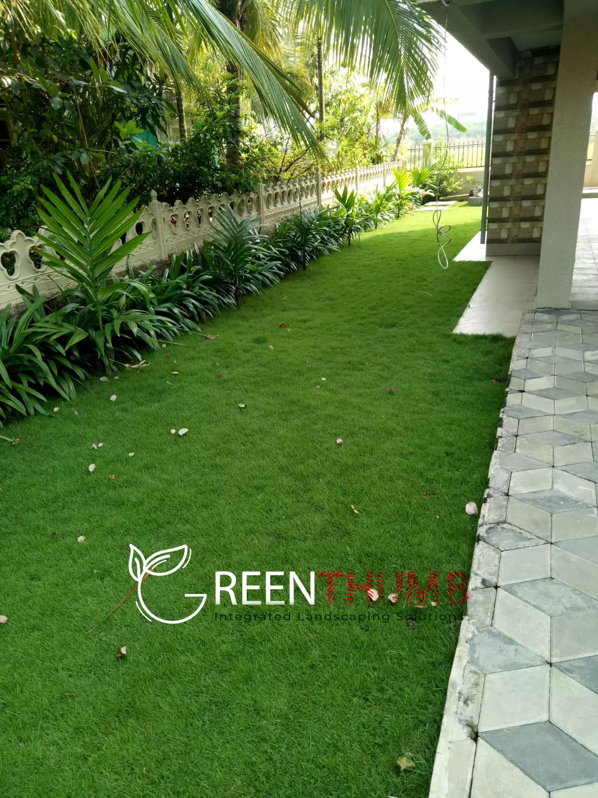 Shaded garden walkway estate Raigad district