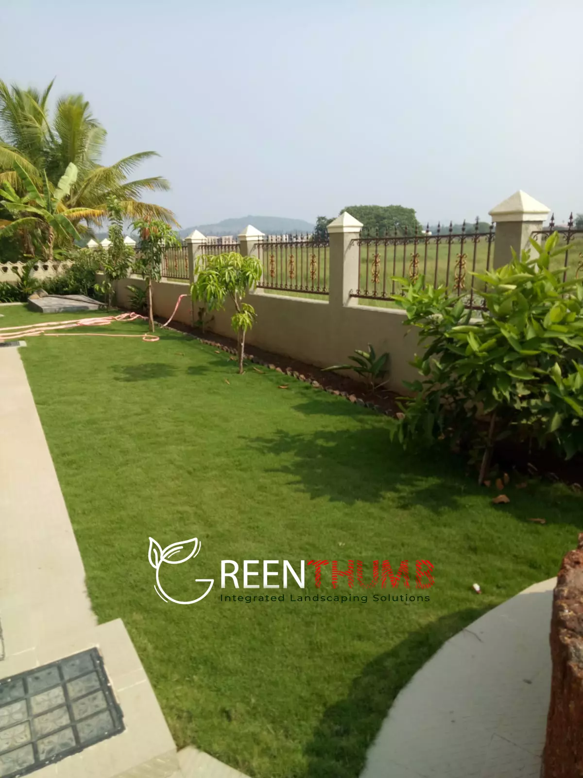 Ornamental planting around villa exterior Alibag